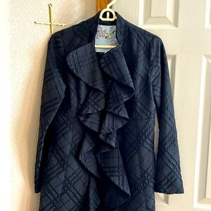 Long black jacket that look great with pants or skirts.